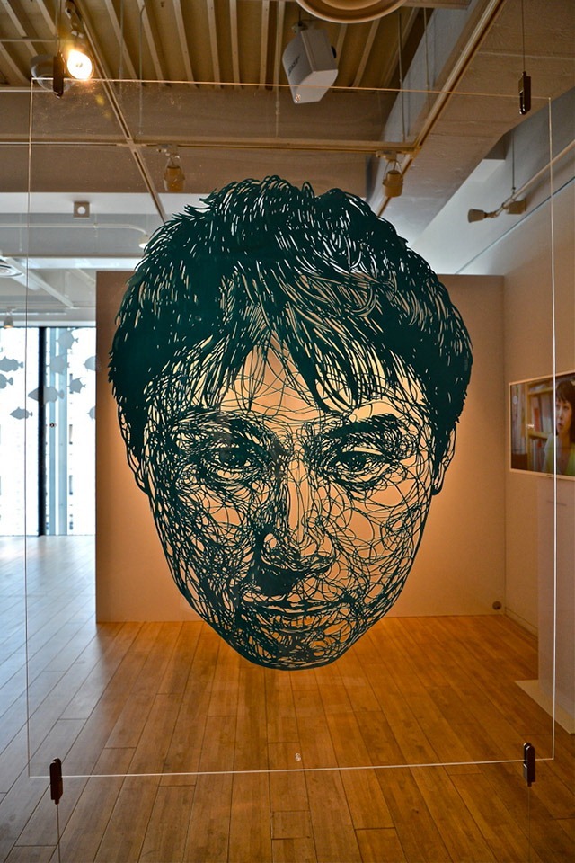 LIFE-SIZED-Large-Scale-Paper-Cutout-Installation-by-Risa-Fukui